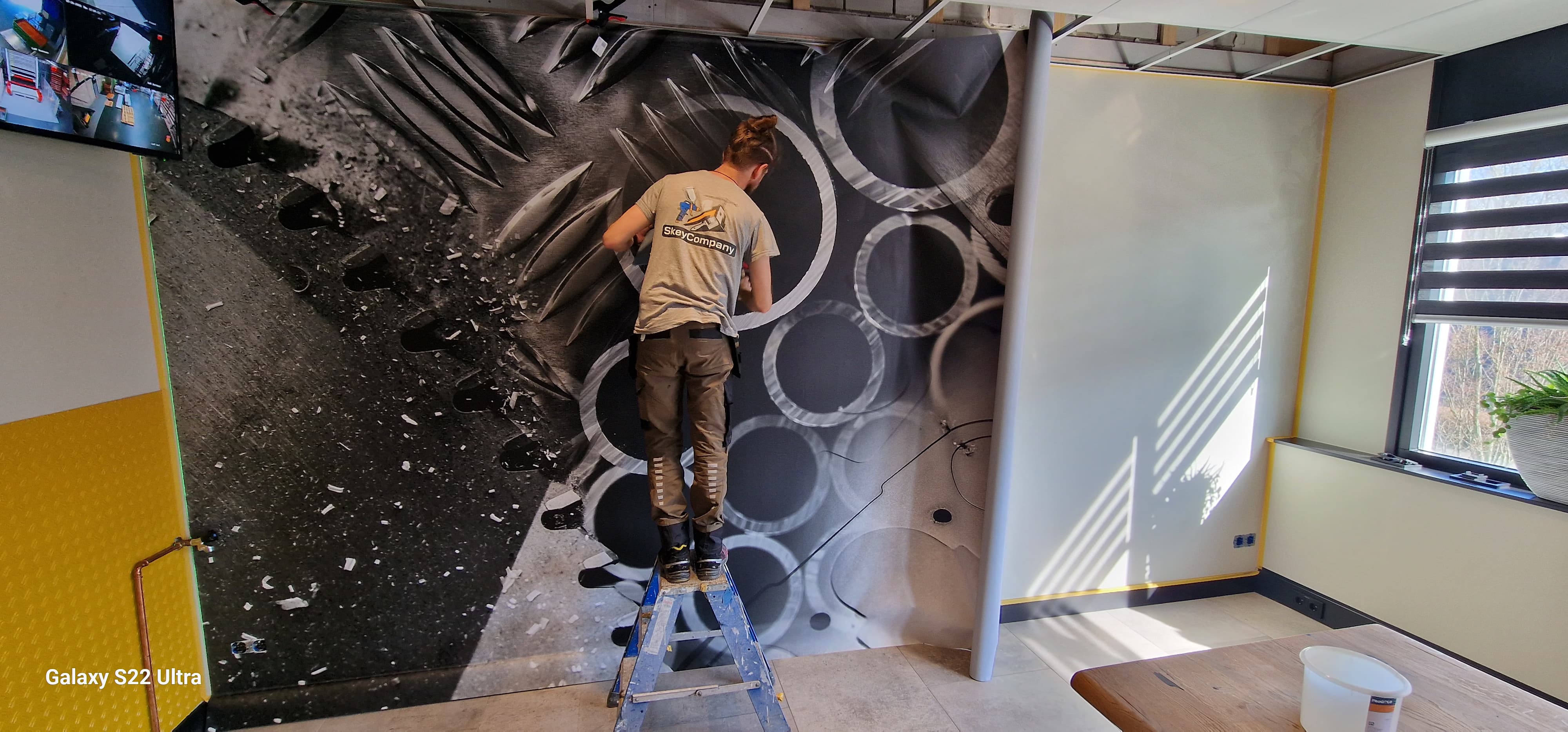 Applicatie fotobehang halverwege